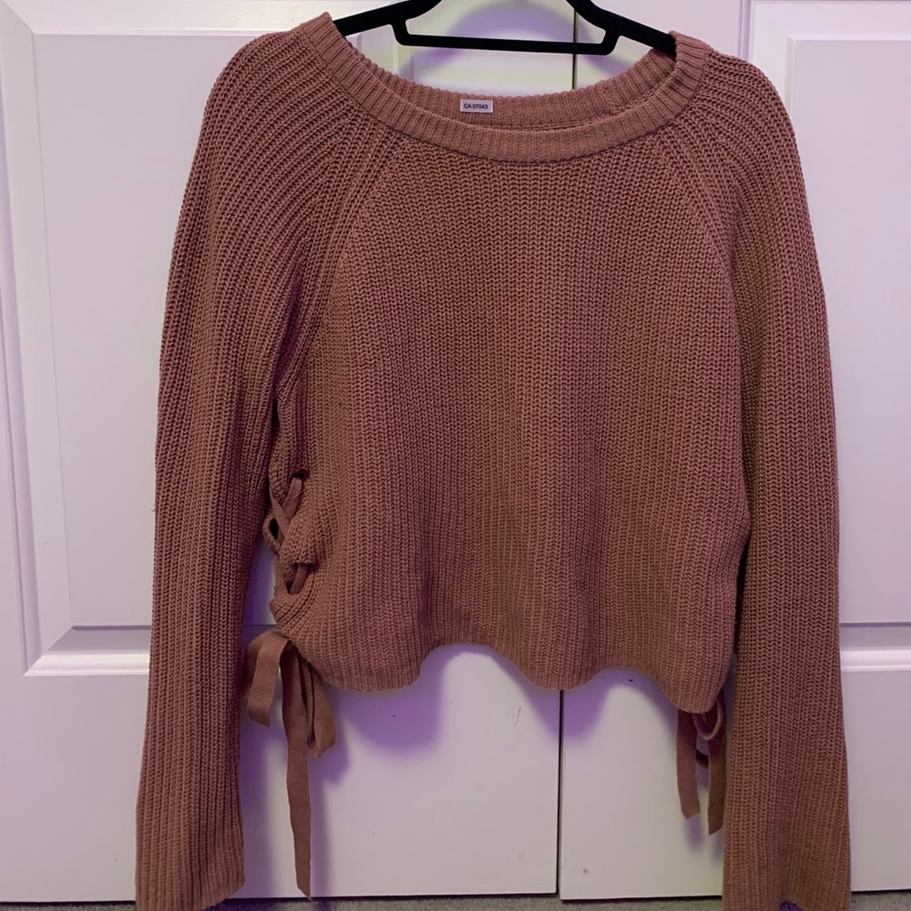 knitted sweater with the bowties on the side